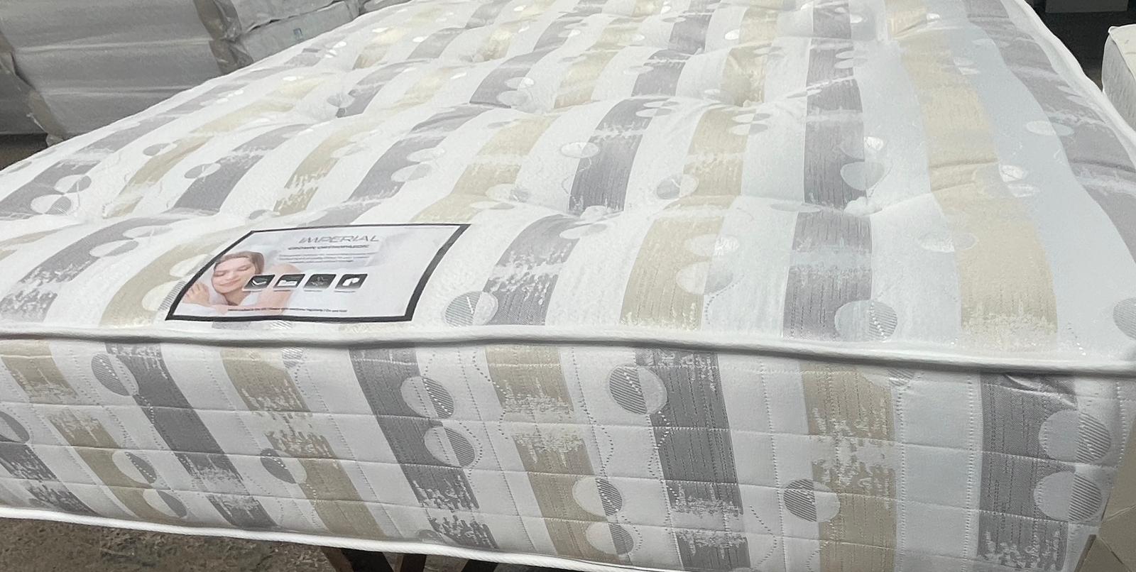 Special super firm mattress. 12.5 gage coil with butterflies on the side, compressed foam layer and polyester on the top.